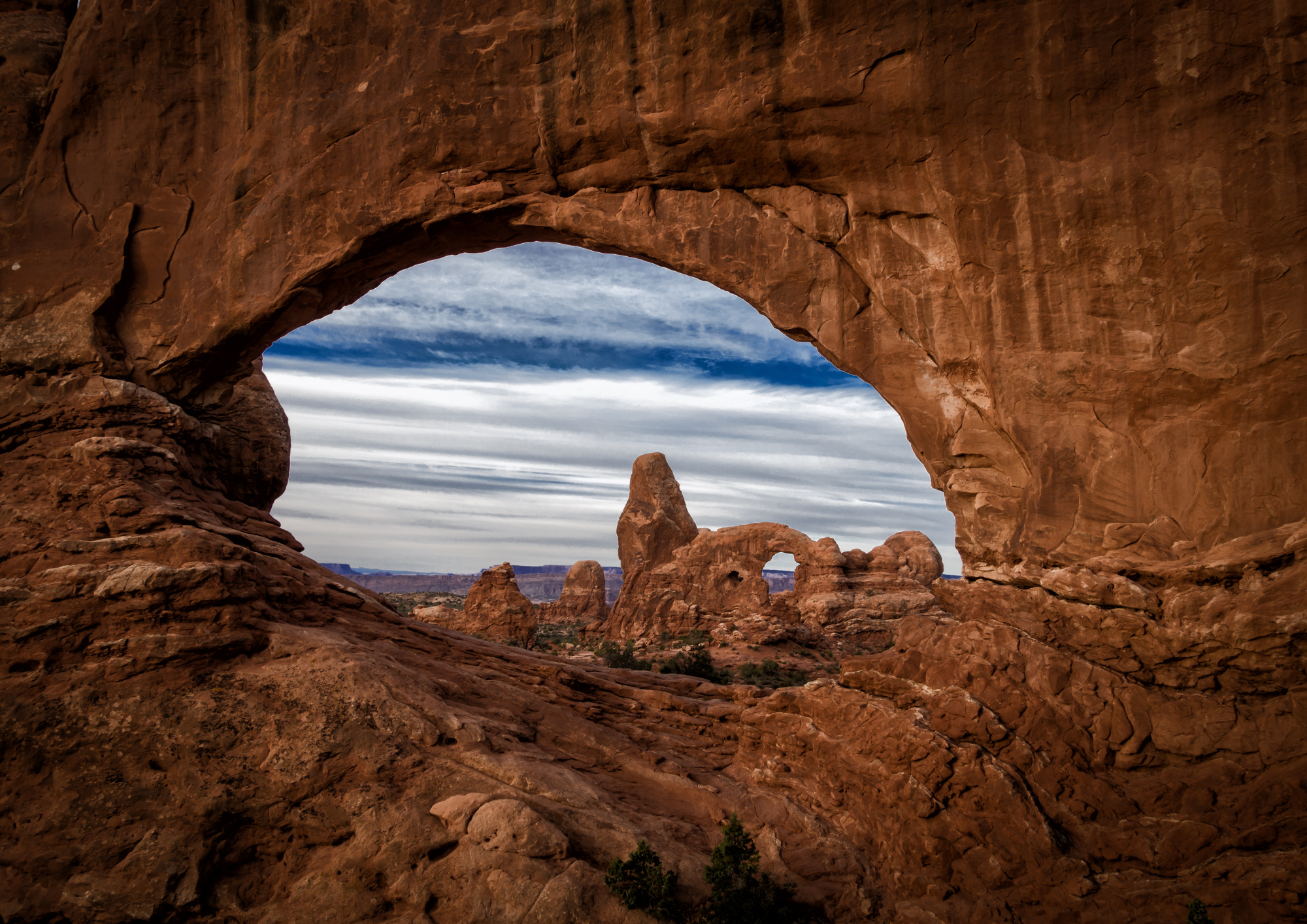 RV campsite with red rock cliffs near Zion National Park in springtime