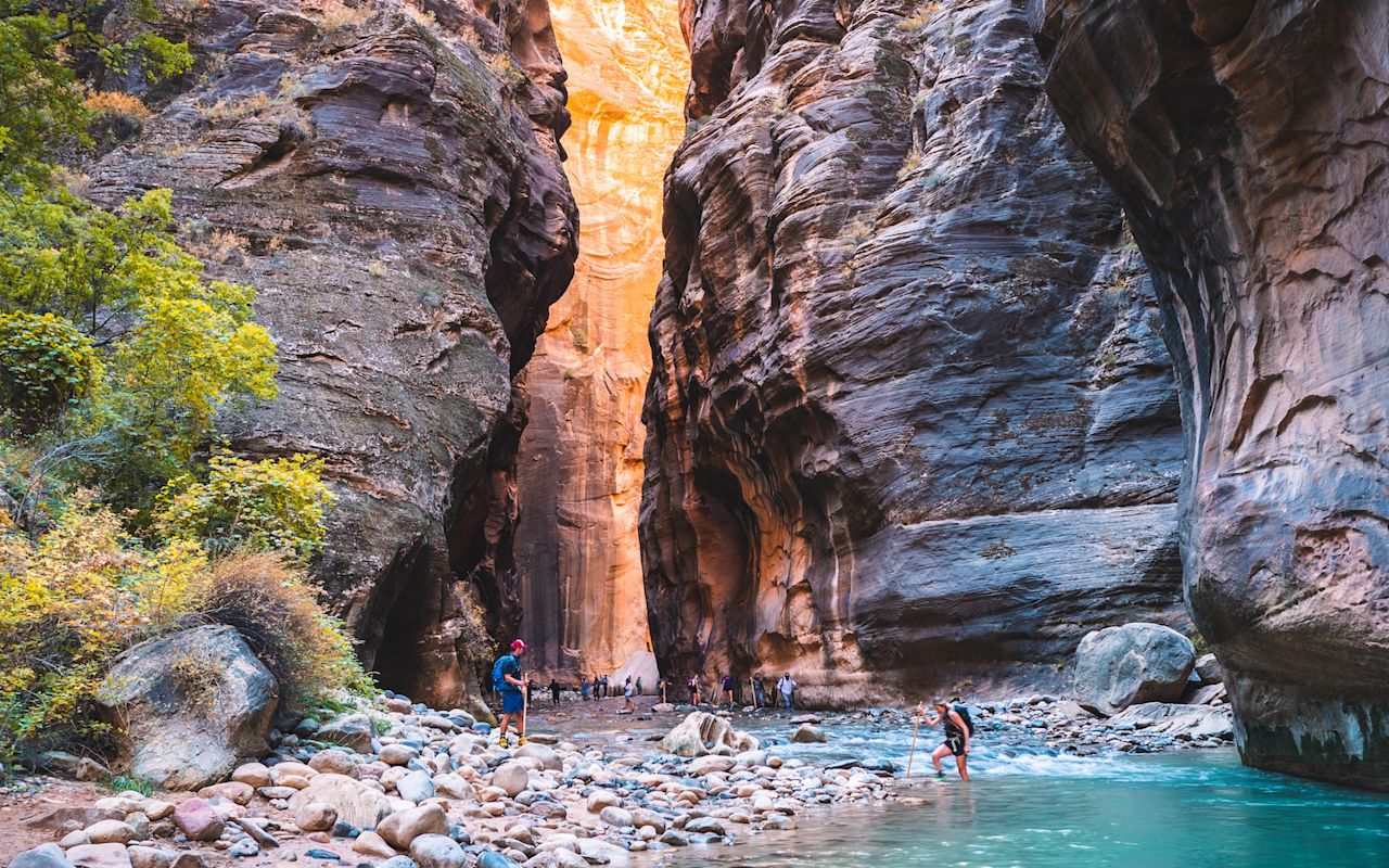 First-time RV parked near Zion cliffs with red rock scenery